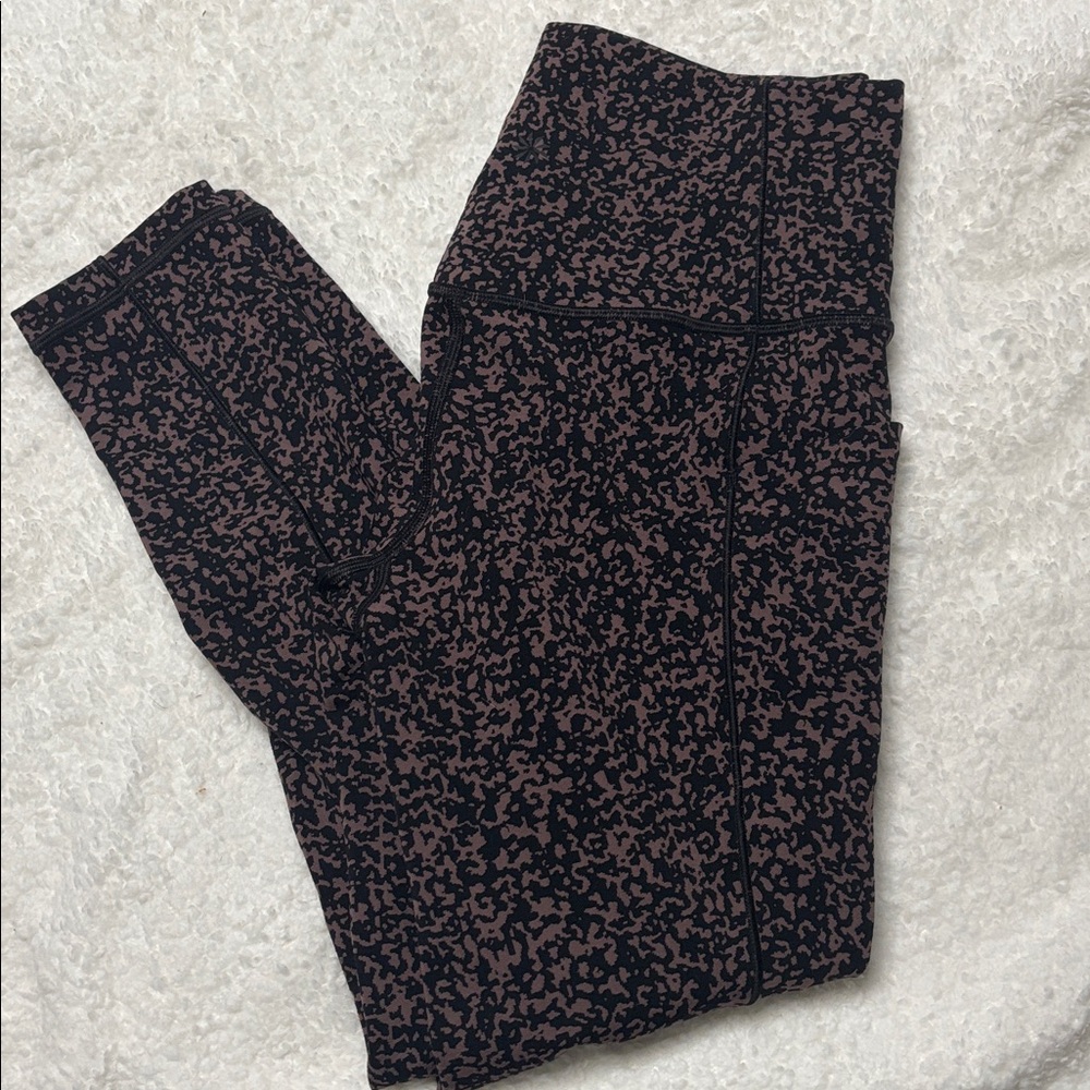 Two pair of Athleta stash- pocket leggings - Picture 4 of 5
